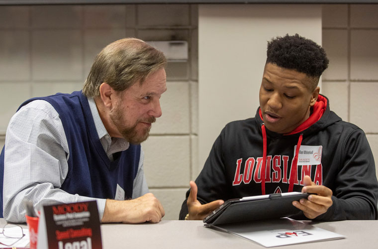 An entrepreneur receiving help from University of Louisiana's business assistance programs