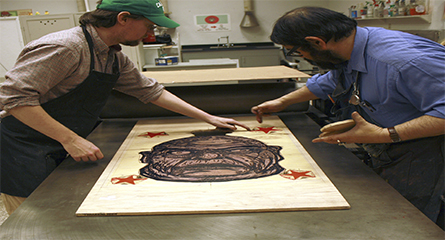 Professor Brian Kelly working with Professor John Handcock on a Marais Press printmaking project.