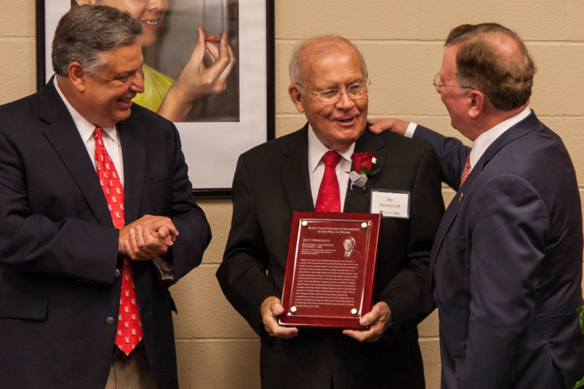 Jay Honeycutt accepting an award for outstanding graduate in electrical engineering from the University of Louisiana at Lafayette.