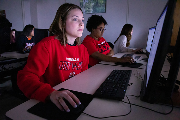 UL Lafayette student at computer