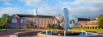 The University of Louisiana at Lafayette Quad with the fleur de lis fountain in the foreground and Stephens Hall bell tower in the background